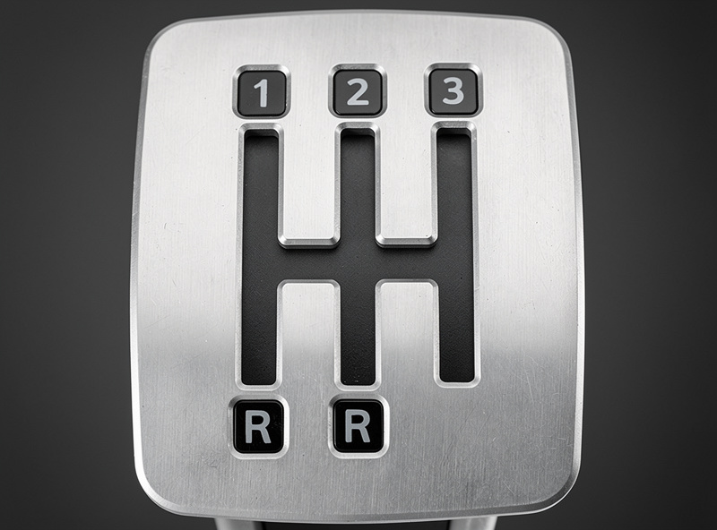 H-pattern shifter gate plate showing gear positions 1 through 6