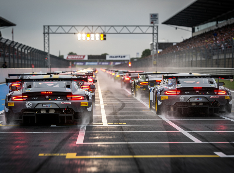 ACC race start from behind showing GT3 cars accelerating from the grid