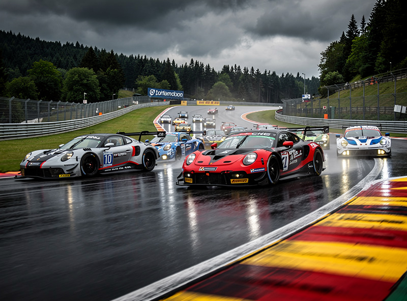 GT3 cars racing wheel to wheel through Eau Rouge at Spa-Francorchamps