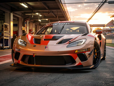 Sim racing GT car front end showing wheel camber and caster