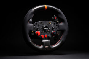 A sim racing wheel rim and button box covered in rotary encoder dials