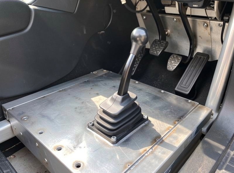 A finished modified brake pedal mounted on a welded steel pedal deck on the sim rig